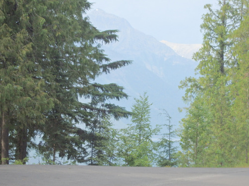 Motion phots with telephoto zoomed ahead, eastbound on Going to the Sun Road.