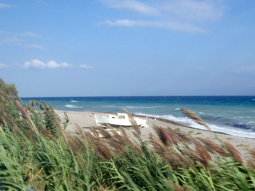 Cycling the Gulf of Corinth's coast.