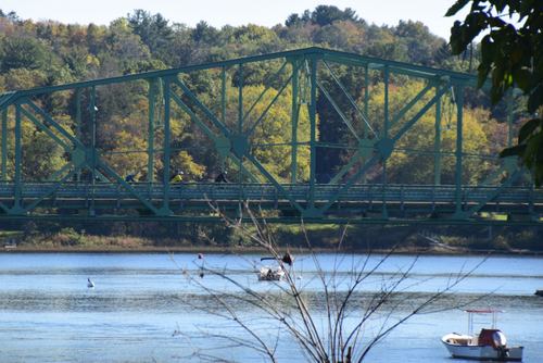 If one looks carefully, it looks like Steve, Karen, and Judy are crossing the bridge.